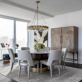 Portfolio: Neutral and sophisticated dining room with a custom table and Meredith Pardue art piece
