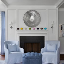 An elegant living room fireplace. 