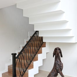 Striking staircase creating a wow factor for entrance hall 