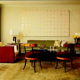 NYC Living Room in an earth tone palette, subtle dot artwork 