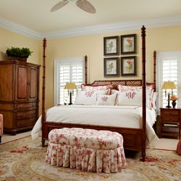 Ruby and white floral patterns on a backdrop of canary yellow walls.
