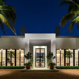 Classical modern symmetry. Steel doors define the rhythm