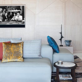 Cosmopolitan of Las Vegas - oak panelling, grey leather sofa