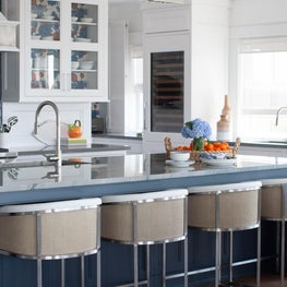 Vinyl fabric barstools and quartzite countertop in an Avalon, NJ beach house
