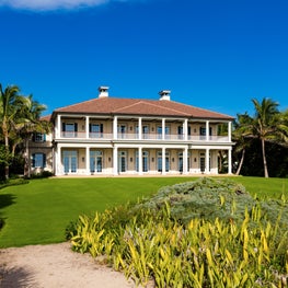 Island Colonial Georgian with low-country accents in an oceanfront setting