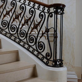 Patinated bronze and gilt detailing on a new neoclassical staircase