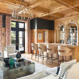 A knotty pine Bar and Club Room with an ocean view in Palm Beach