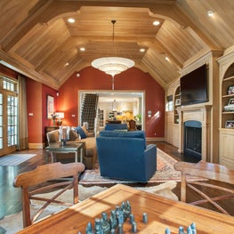 Family Room in an updated eclectic Main Line manor house.