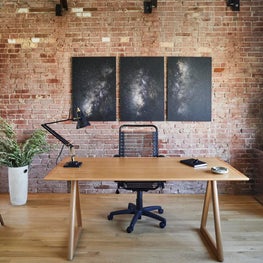 Industrial Office with Brick Wall and Triptych