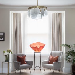 Vintage chairs in eclectic living room 