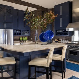 Penthouse kitchen accented in blue