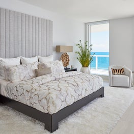 Palm Beach Oceanside Sophistication Master Bedroom with modern shag white area rug.