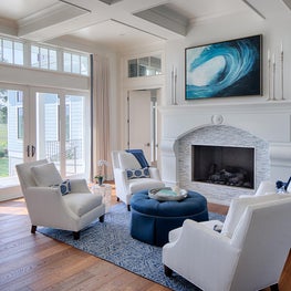 The pops of blue really make the living room