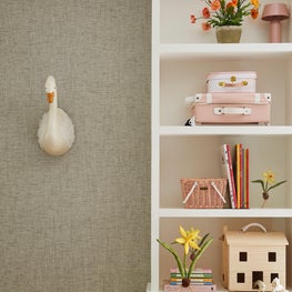 Playful built in bookcase with colorful childrens accessories