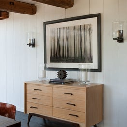 Hamptons barn house dining room with wood beam ceilings