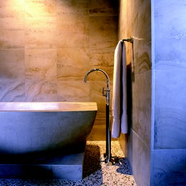 Luxurious spa master bathroom in an Arizona home, with freestanding bathtub