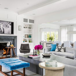 Transitional Living Room, Paneled Walls, Turquoise Accents, Modern Stone Mantle