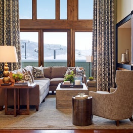 Pattern and rich texture in cool tones mixed with warm wood and hard finishes.