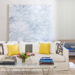 Fresh and Fun Living Room. Pops of Yellow and Blue. Large-Scale Art.