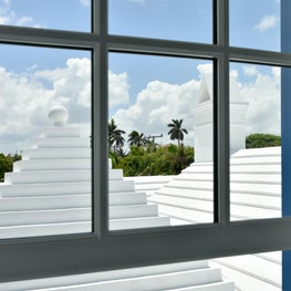 Clean and crisp roofscape in a Palm Beach surf cottage.