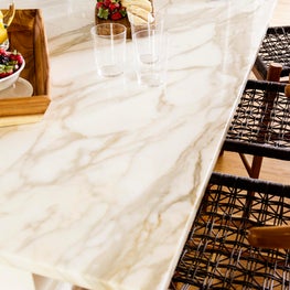 Calacatta marble kitchen island w modern counter stools Sophia Shibles Interiors
