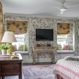 Wallpapered Bedroom with Printed Relaxed Roman Shades