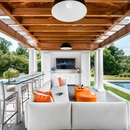 Pool house with cedar trellis