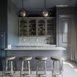 Home Theatre bar with mosaic splash and retro lighting 