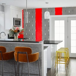 Mix of paint and  black and white wallpaper.  Makes a colorful kitchen design 