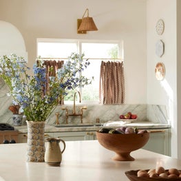 Kitchen with Cafe Curtains and Wall Plates