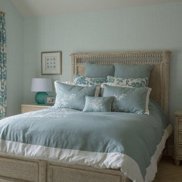 Blue bedroom with coastal motifs