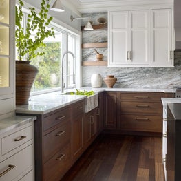 Contemporary Farmhouse Kitchen with White & Walnut Cabinetry and Natural Stone Slab