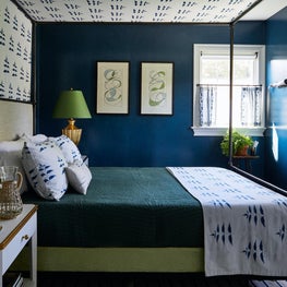 Guest Bedroom with blue walls and four poster bed