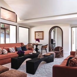 A Large Rustic Family Room Combines Modern Forms and Spanish Colonial Antiques