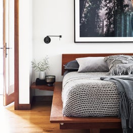 Soulful Home Master Bedroom - Thos. Moser Bed with wall-mounted reading lamps