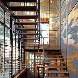 Soho Loft Staircase with blue and gold walls