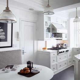 Bright black and white kitchen with coffered ceiling 
