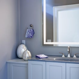 Custom designed vanity with pre-lite electric mirror