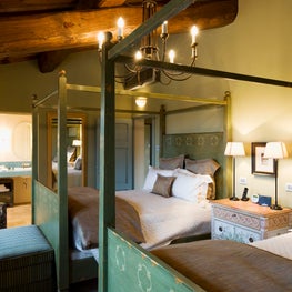 A guest suite of soft hues, hand painted furnishings and Italian architecture