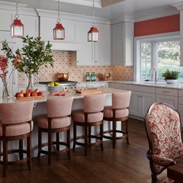 Lake Geneva Kitchen. Gray, coral & orange scheme with red lantern pendants.
