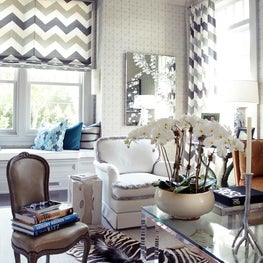 The Hamptons Designer Showhouse- library room with zebra rug, chevron curtains
