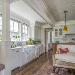 Bright Kitchen with Dark Hardwood Flooring and Coffered Ceiling with V-Groove 