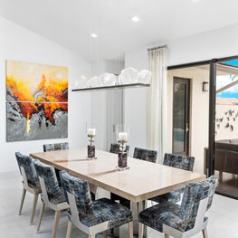 LAKEFRONT CONTEMPORARY VILLA modern dining room, open concept, large modern painting, glass doors, modern dining chairs