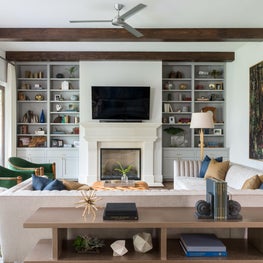 Portfolio: Stylish sitting area featuring on-trend custom-upholstered, antique chairs