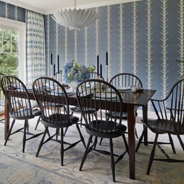 Glenview Dining Room. Blue, white and black dining room with acanthus grasscloth walls, ikat drapes, & muted rug.
