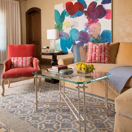A Meredith Pardue painting is the focal point of this sitting room