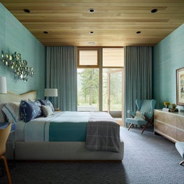 Tahoe Marvel, Guest Bedroom with blue grass cloth walls and a custom bed.