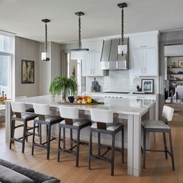 Open Plan Kitchen featuring pendants from a Paris Gallery.
