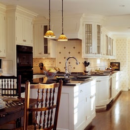 Custom kitchen:curved leaded glass cabinets:Tiffany pendamts
