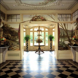 Grand entrance with impressive wall mural.